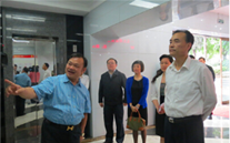 重庆市市委常委、统战部部长刘光磊来英国上市公司365集团视察调研